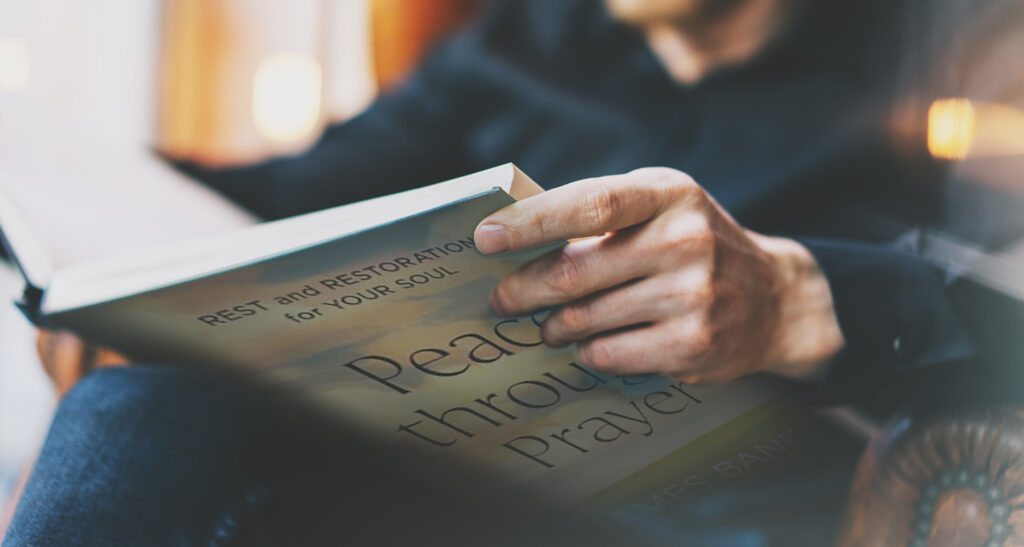 Man reading Peace through prayer